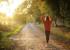 Woman walking on the road